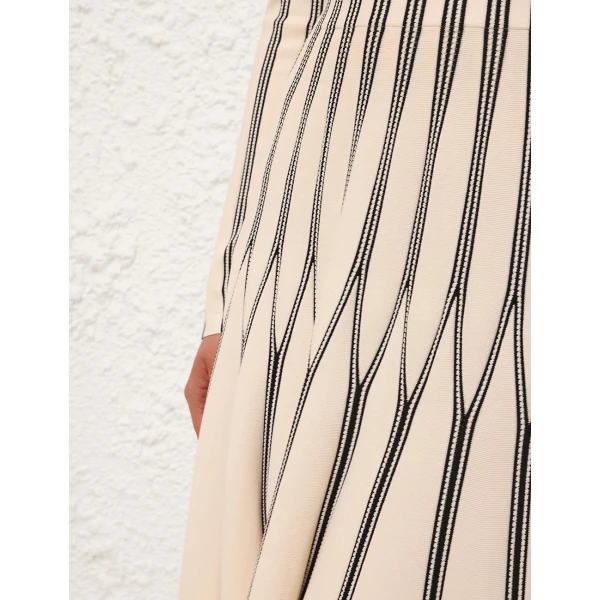 Elevate your elegance in this Zimmermann Skirts available now at Coveti