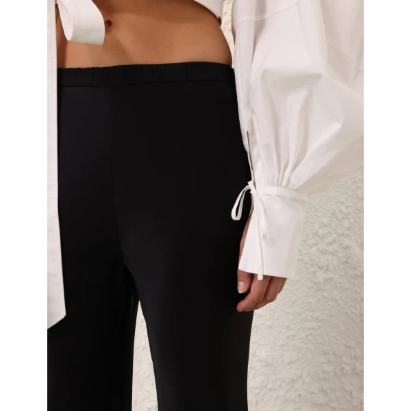 Elevate your elegance in this Zimmermann Pants available now at Coveti