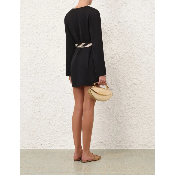 Elevate your elegance in this Zimmermann Tops available now at Coveti