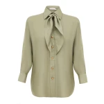 Elevate your elegance in this Zimmermann Tops available now at Coveti