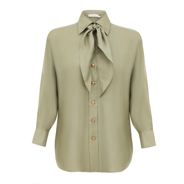 Elevate your elegance in this Zimmermann Tops available now at Coveti