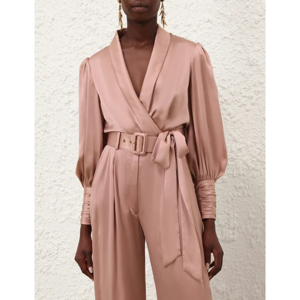 Elevate your elegance in this Zimmermann Tops available now at Coveti