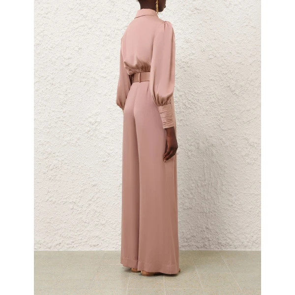 Elevate your elegance in this Zimmermann Tops available now at Coveti