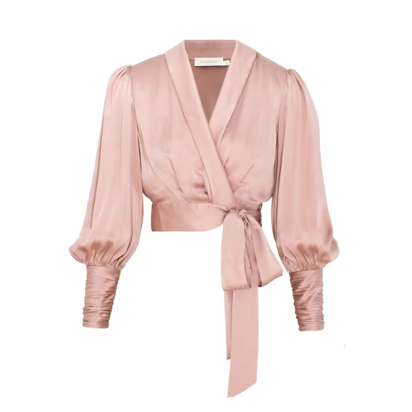 Elevate your elegance in this Zimmermann Tops available now at Coveti