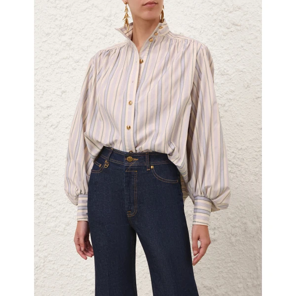 Elevate your elegance in this Zimmermann Tops available now at Coveti