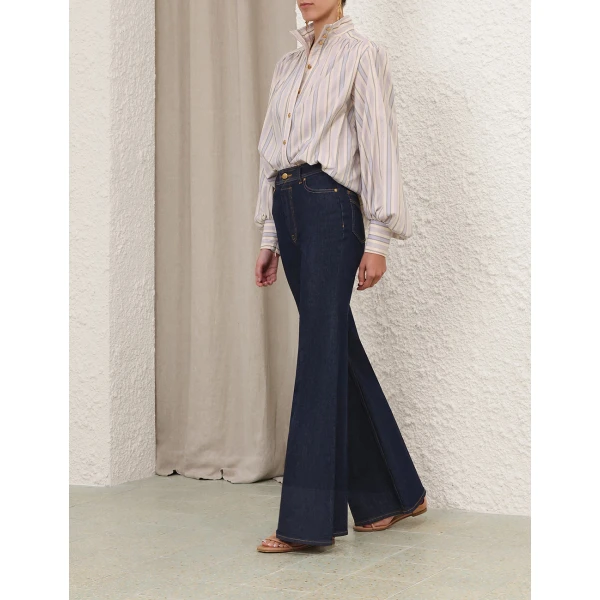 Elevate your elegance in this Zimmermann Tops available now at Coveti