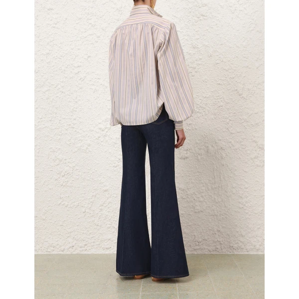 Elevate your elegance in this Zimmermann Tops available now at Coveti