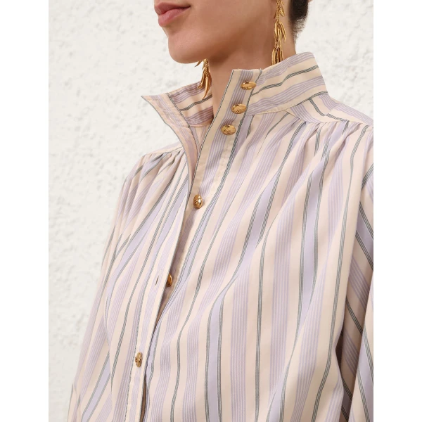 Elevate your elegance in this Zimmermann Tops available now at Coveti