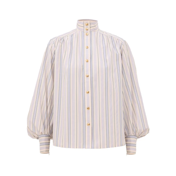 Elevate your elegance in this Zimmermann Tops available now at Coveti