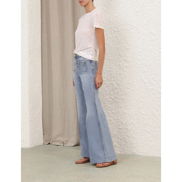 Elevate your elegance in this Zimmermann Tops available now at Coveti