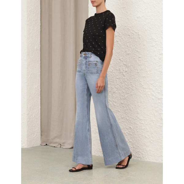 Elevate your elegance in this Zimmermann Tops available now at Coveti