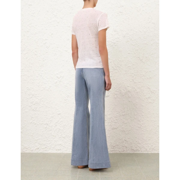 Elevate your elegance in this Zimmermann Tops available now at Coveti