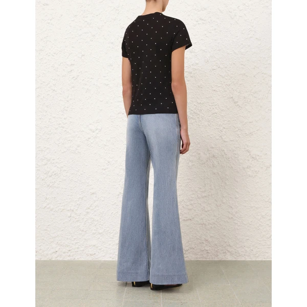 Elevate your elegance in this Zimmermann Tops available now at Coveti