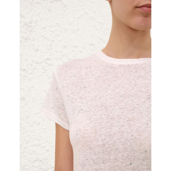 Elevate your elegance in this Zimmermann Tops available now at Coveti