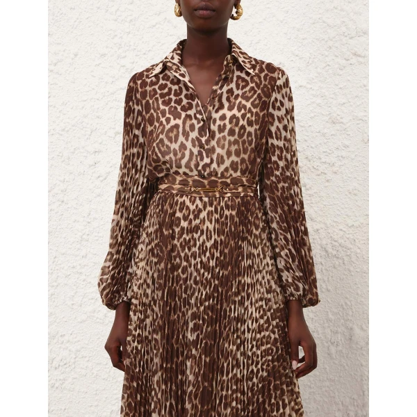 Elevate your elegance in this Zimmermann Tops available now at Coveti