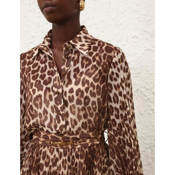 Elevate your elegance in this Zimmermann Tops available now at Coveti