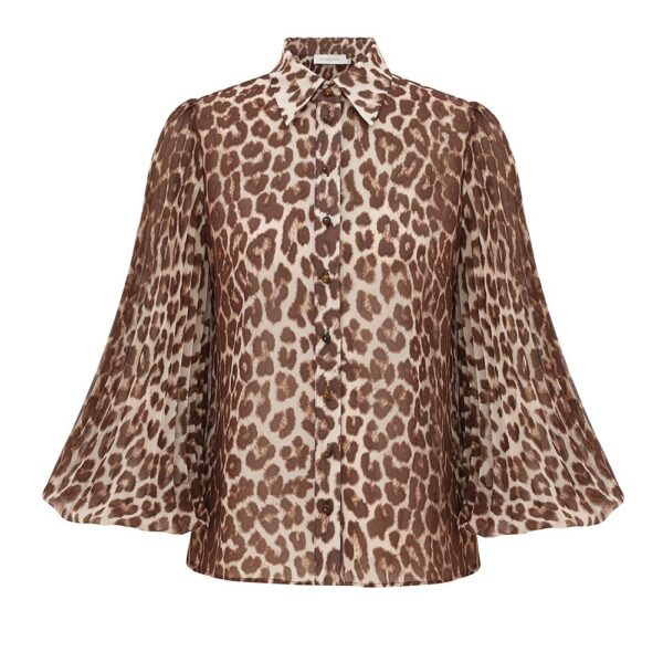 Elevate your elegance in this Zimmermann Tops available now at Coveti