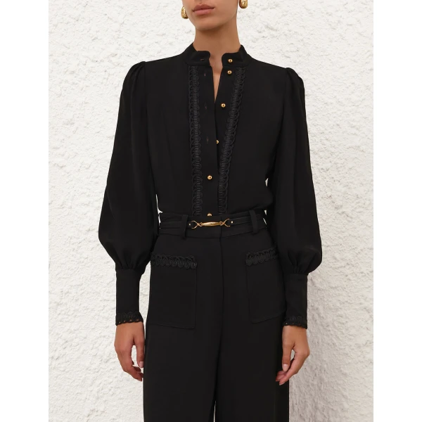 Elevate your elegance in this Zimmermann Tops available now at Coveti