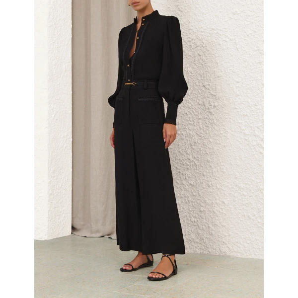 Elevate your elegance in this Zimmermann Tops available now at Coveti