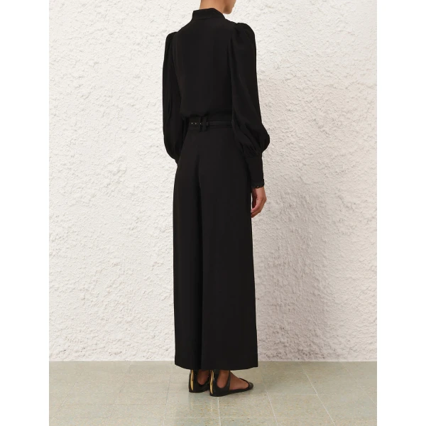 Elevate your elegance in this Zimmermann Tops available now at Coveti