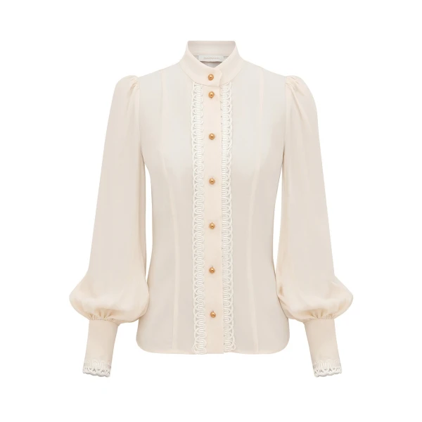 Elevate your elegance in this Zimmermann Tops available now at Coveti