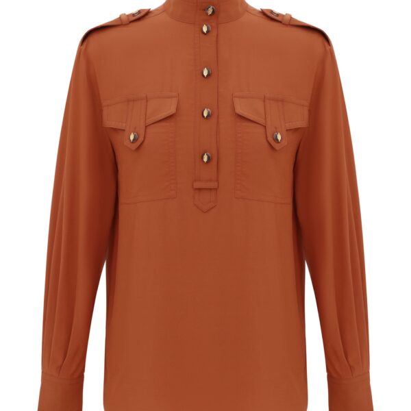 Elevate your elegance in this Zimmermann Tops available now at Coveti