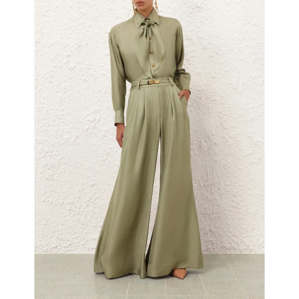 Elevate your elegance in this Zimmermann Pants available now at Coveti