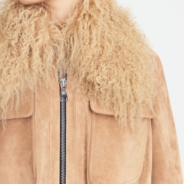 Elevate your elegance in this 16 Arlington Jackets from the luxury feather dress edit