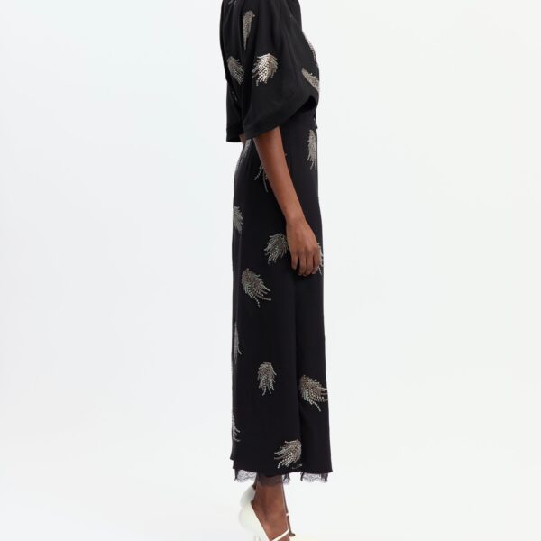Elevate your elegance in this 16 Arlington Dresses from the luxury feather dress edit