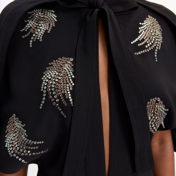 Elevate your elegance in this 16 Arlington Dresses from the luxury feather dress edit