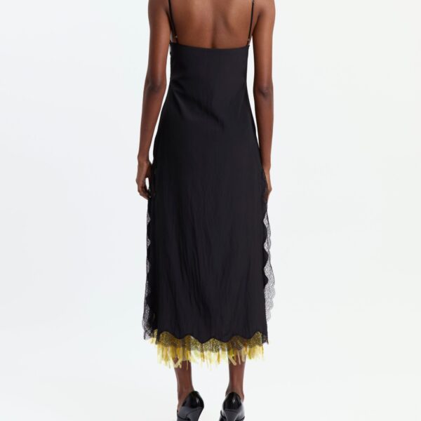 Elevate your elegance in this 16 Arlington Dresses from the luxury feather dress edit