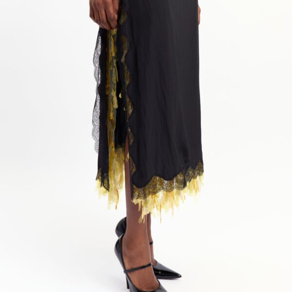 Elevate your elegance in this 16 Arlington Dresses from the luxury feather dress edit