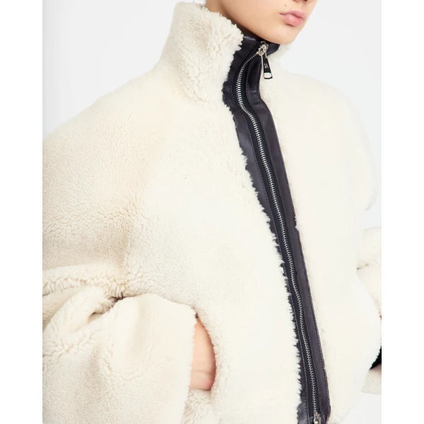 Elevate your elegance in this 16 Arlington Jackets from the luxury feather dress edit