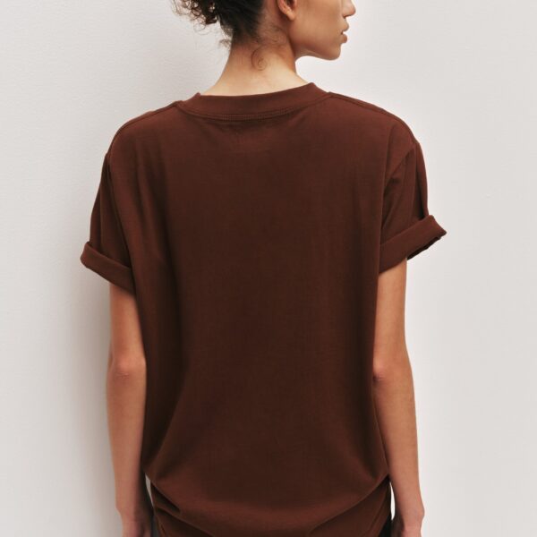 Aje Aus  – structured silhouette with raw femininity from Coveti