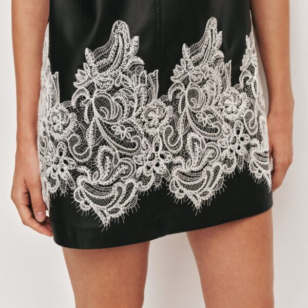 Aje Aus  – structured silhouette with raw femininity from Coveti