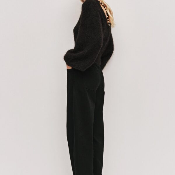 Aje Aus  – structured silhouette with raw femininity from Coveti