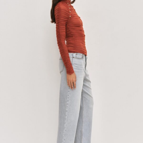 Aje Aus  – structured silhouette with raw femininity from Coveti