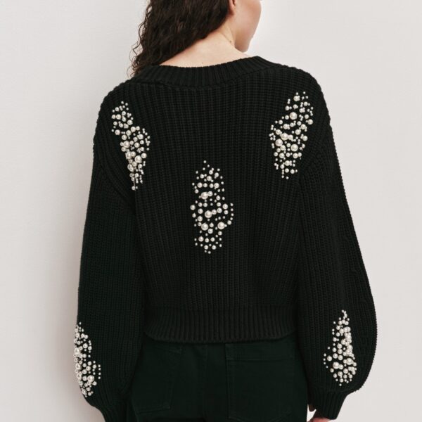 Aje Aus  – structured silhouette with raw femininity from Coveti