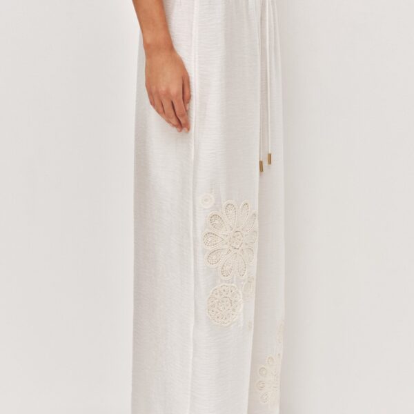 Aje Aus  – structured silhouette with raw femininity from Coveti