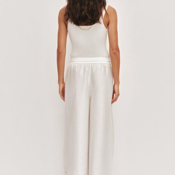 Aje world  – structured silhouette with raw femininity from Coveti