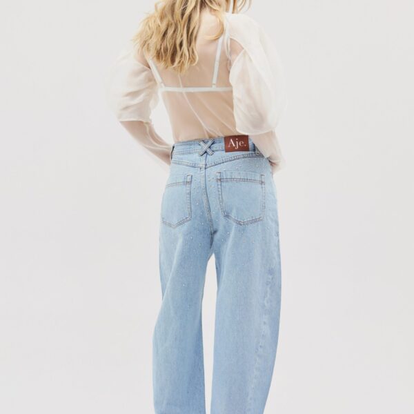 Aje Aus  – structured silhouette with raw femininity from Coveti