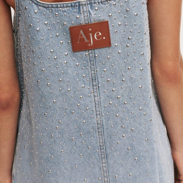 Aje Aus  – structured silhouette with raw femininity from Coveti