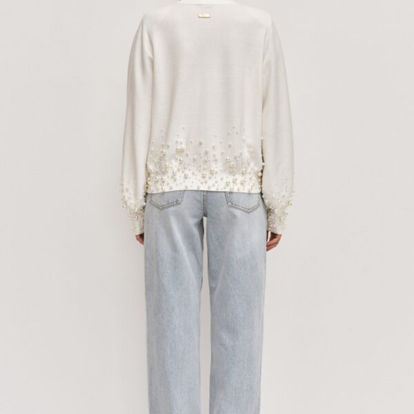 Aje Aus  – structured silhouette with raw femininity from Coveti