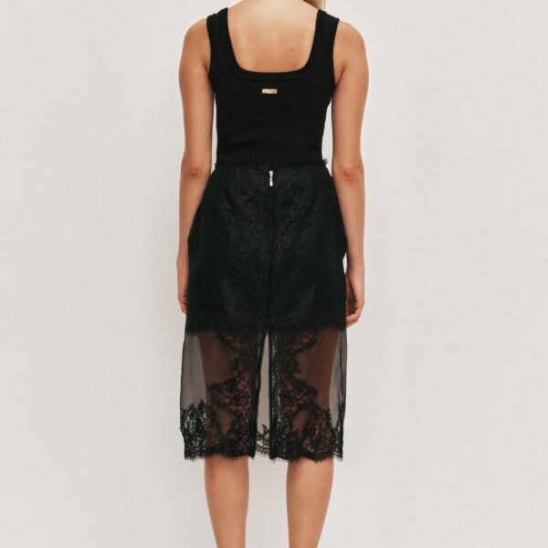 Aje clothing Aus  – structured silhouette with raw femininity from Coveti