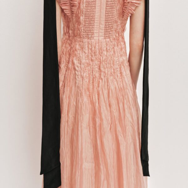 Aje Aus  – structured silhouette with raw femininity from Coveti