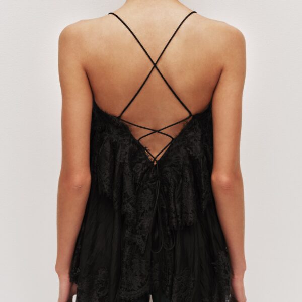 Aje Aus  – structured silhouette with raw femininity from Coveti