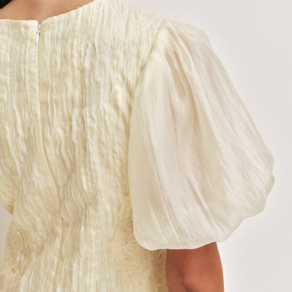 Aje world  – structured silhouette with raw femininity from Coveti