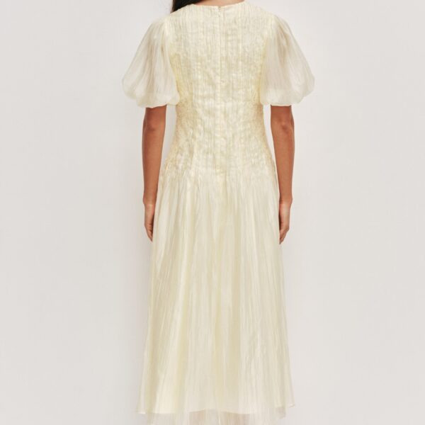 Aje Aus  – structured silhouette with raw femininity from Coveti
