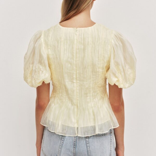 Aje Aus  – structured silhouette with raw femininity from Coveti