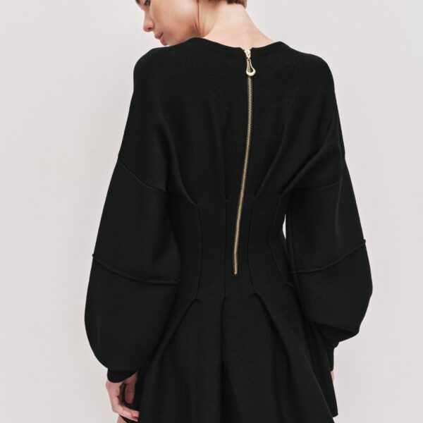 Aje Aus  – structured silhouette with raw femininity from Coveti